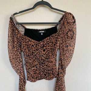 Sheer leopard puff sleeve top